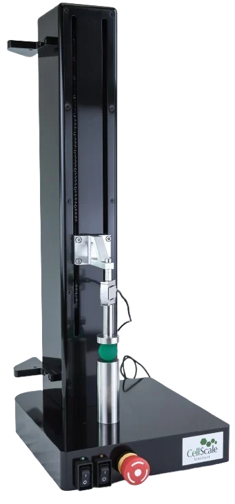 The UniVert S uniaxial mechanical testing system setup with a green ball sample under compression testing