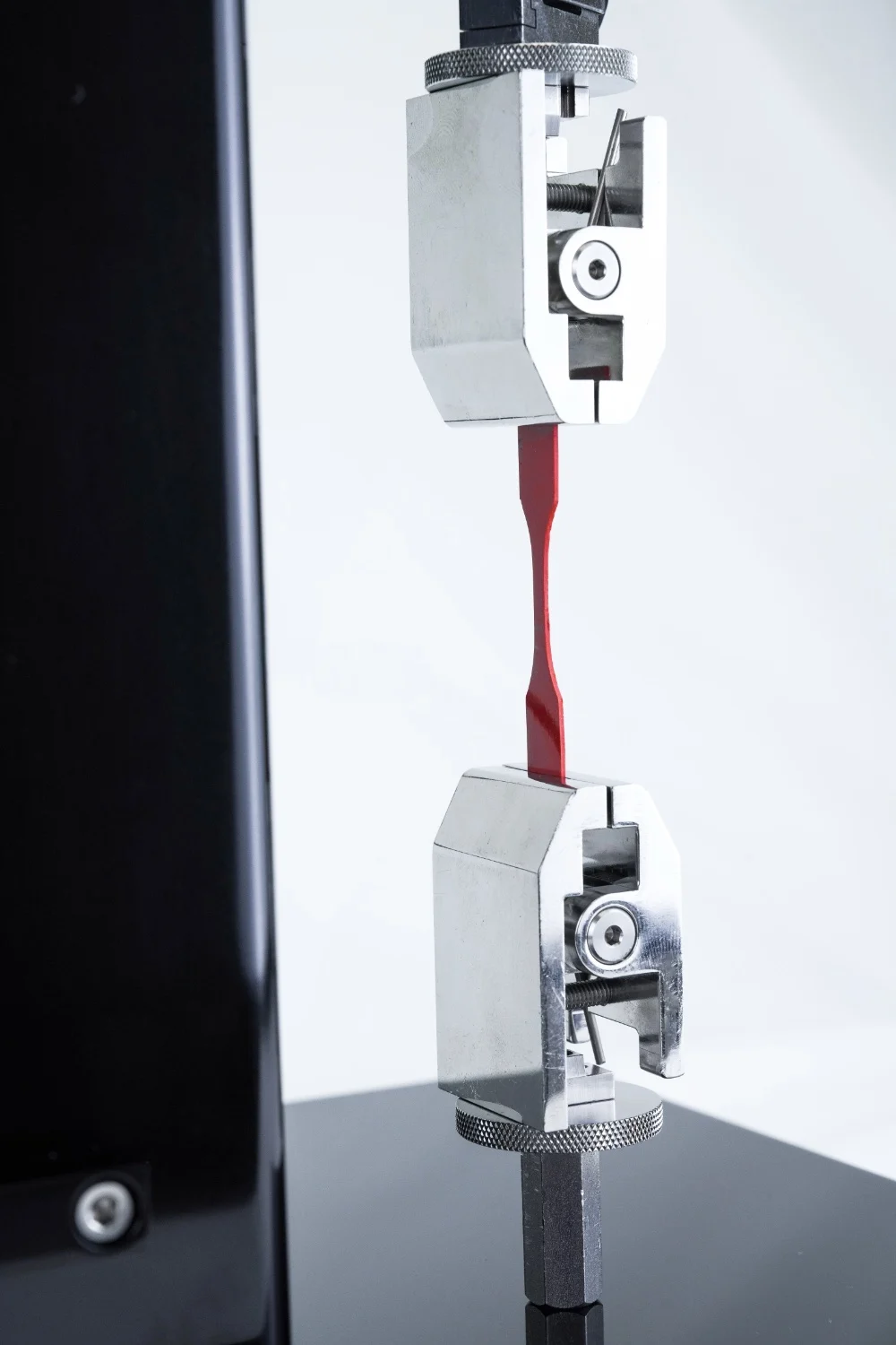Closeup of a sample being tensile tested for fatigue testing