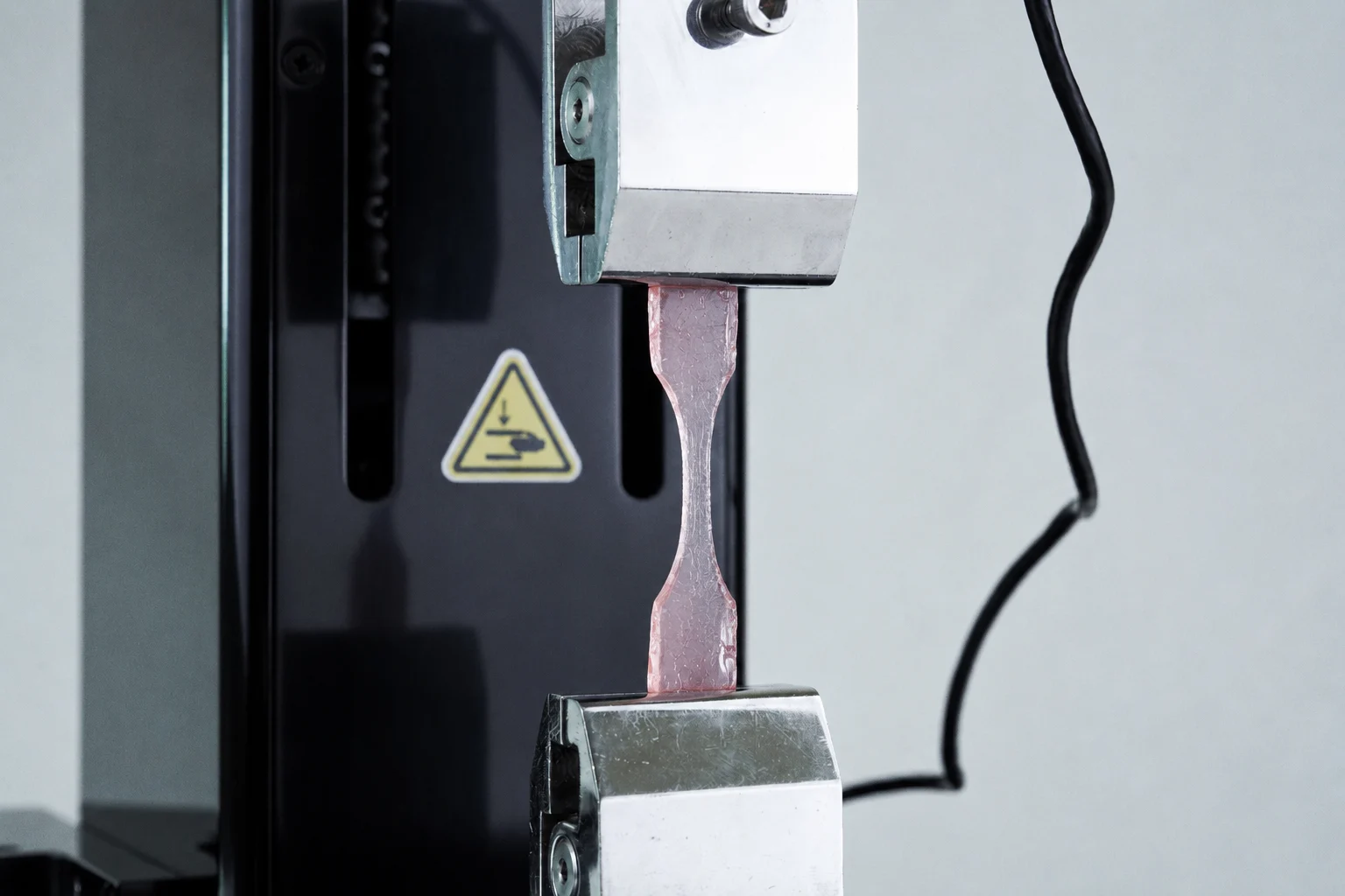A hydrogel strip under material fatigue testing on the UniVert