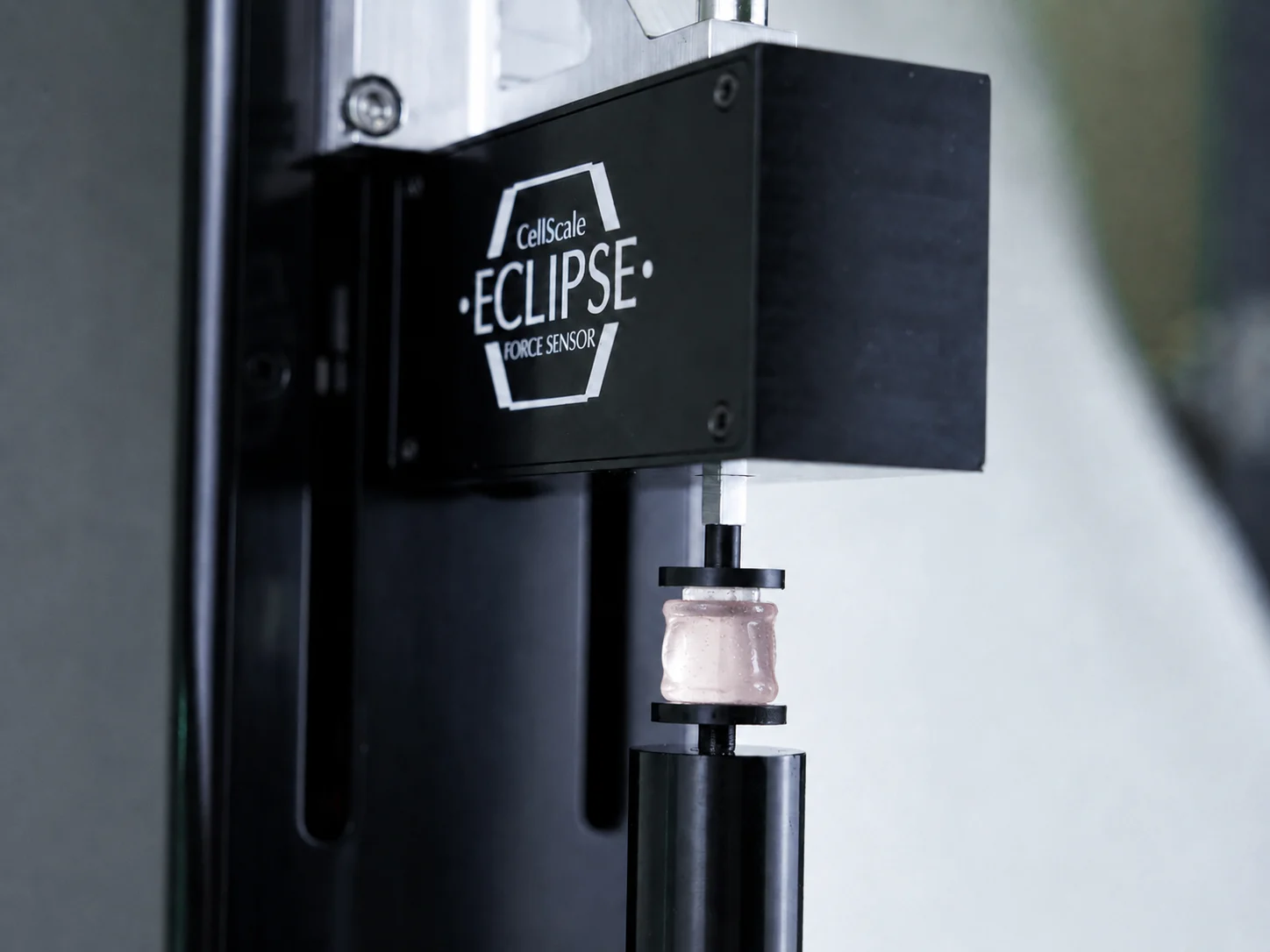 A stimuli responsive hydrogel sample being compression tested with the Eclipse Force Sensor