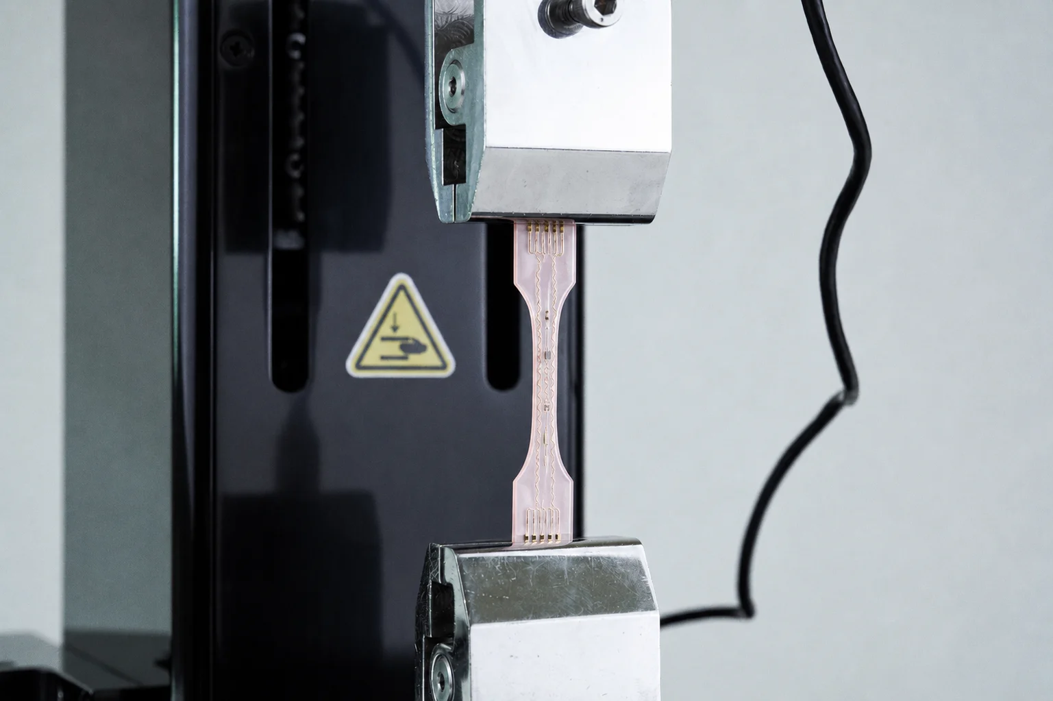 An electronic sensor strip under tension testing for wearable bioelectronics research