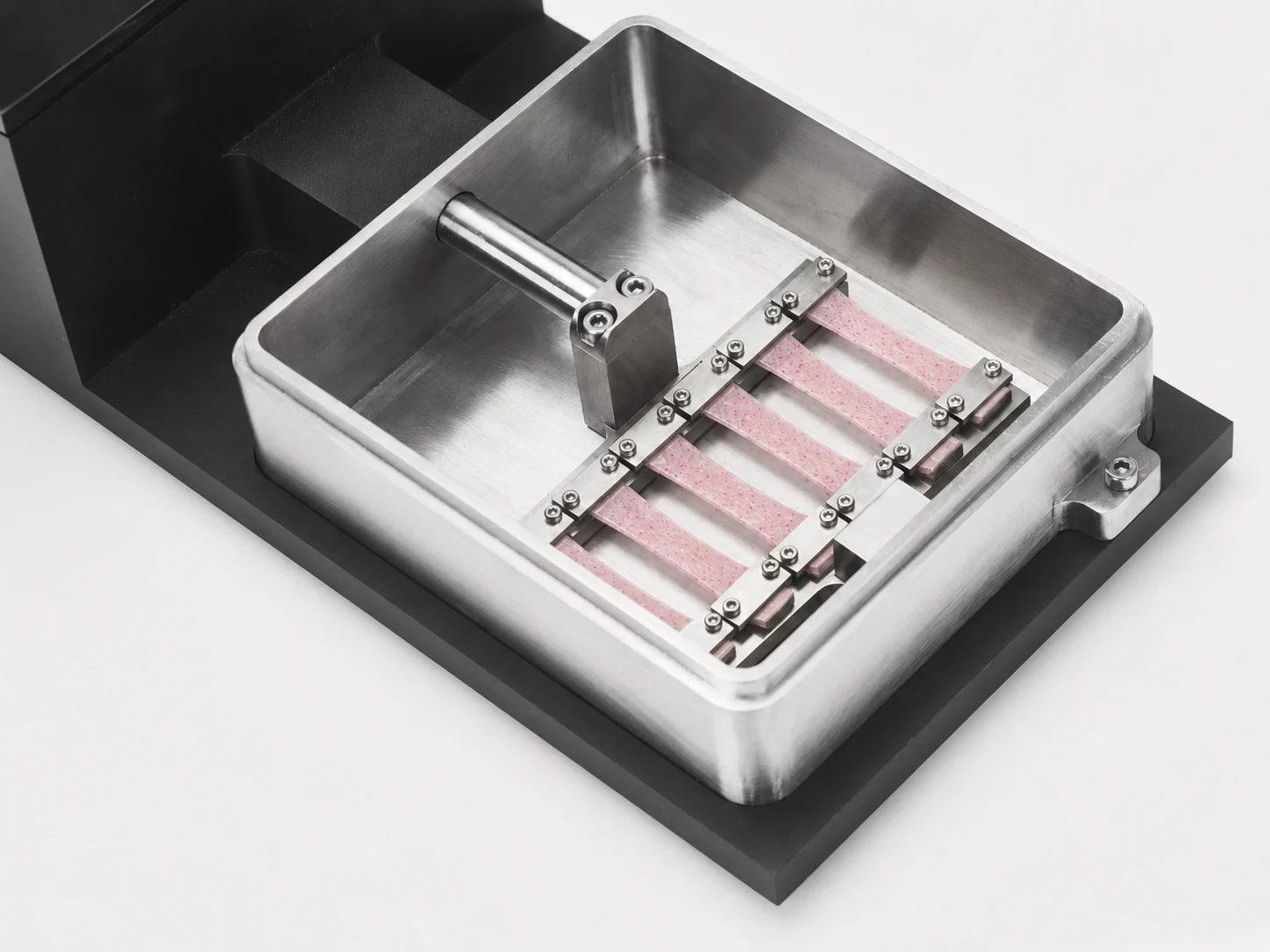 The MCT6 with cell-laden tissue strips loaded for tensile stimulation mechanotransduction research