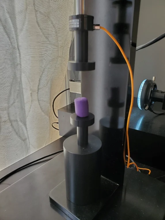 Play-Doh sample placed on the UniVert for compression testing